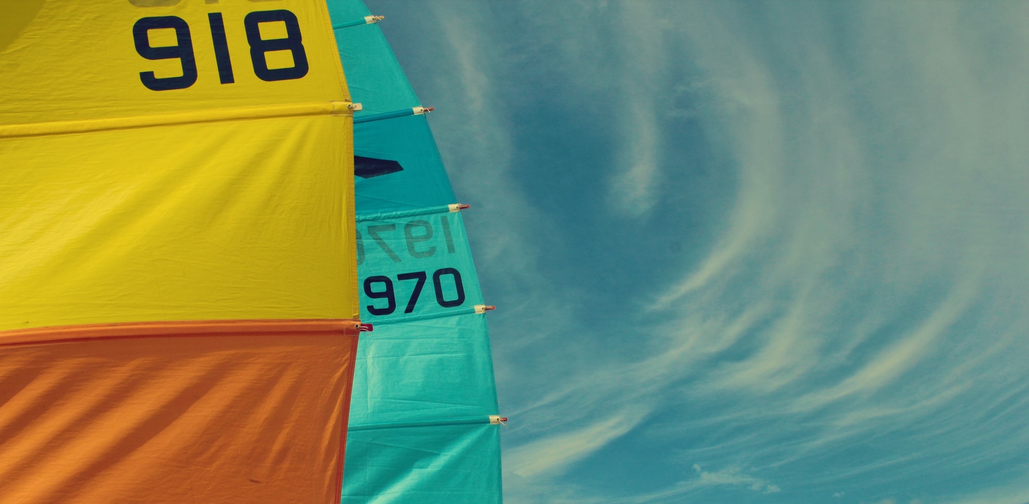 Colourful sailing boat spinnakers