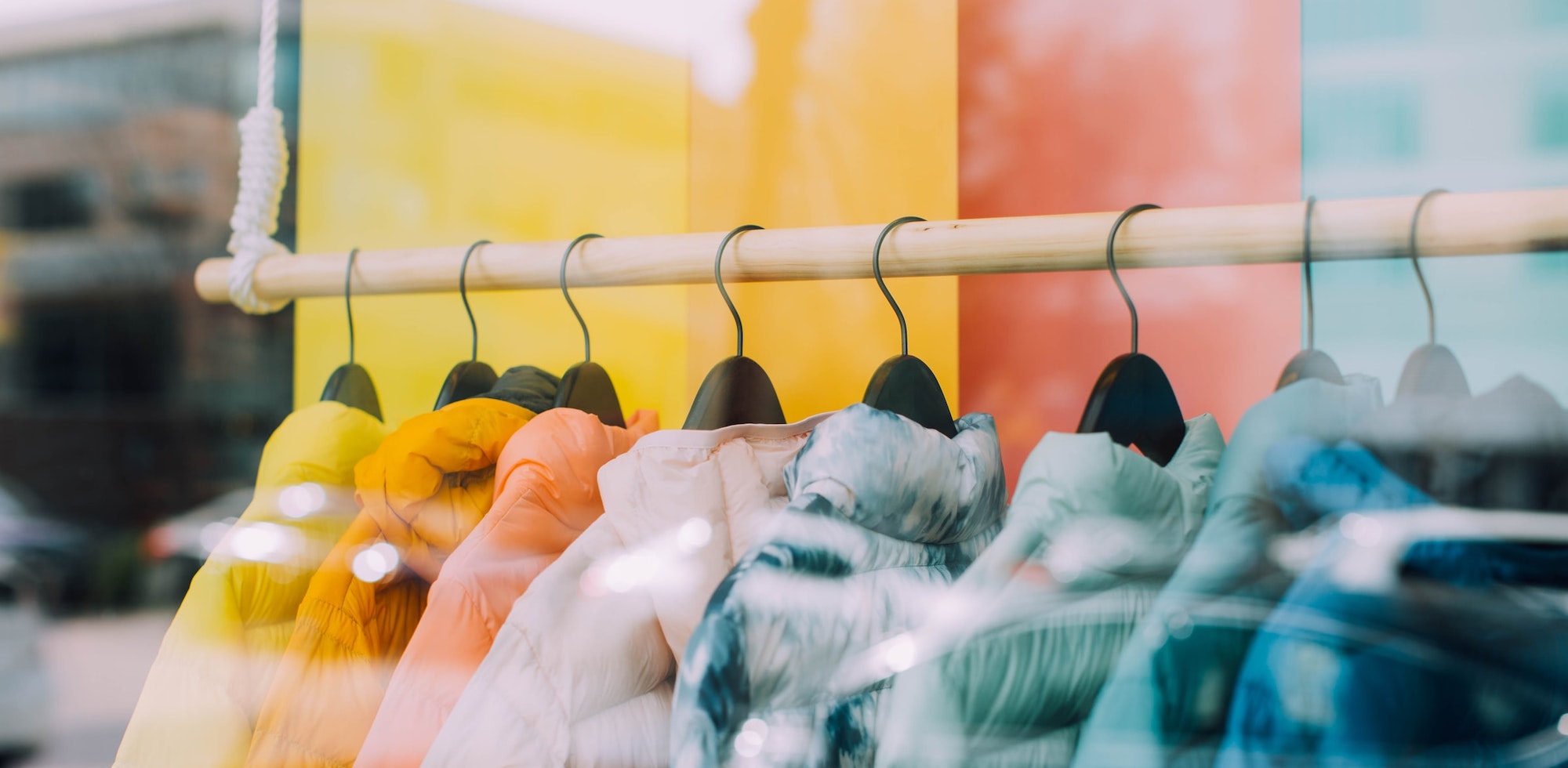 Bright coloured jackets on a rack